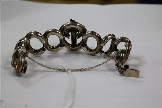 A late Victorian engraved silver and inset Scottish hardstone oval link bracelet.